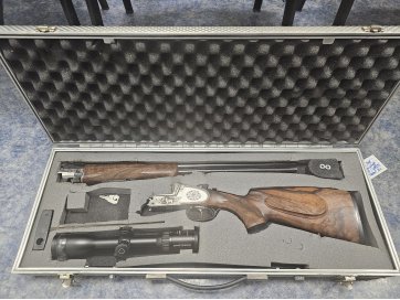 Vintraudne püss Krieghoff koos relvakohvri, puhastamisvarda ja 2 õppepadruniga ja optiline sihik Schmidt & Bender